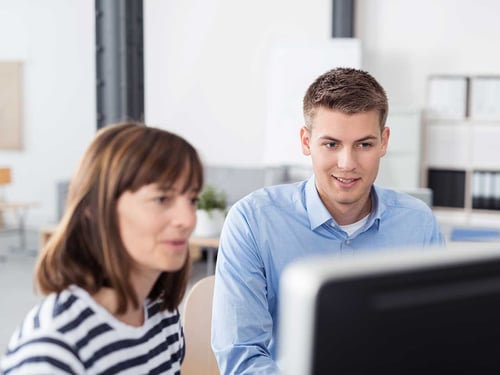 The employees of Go On company sitting in a computer